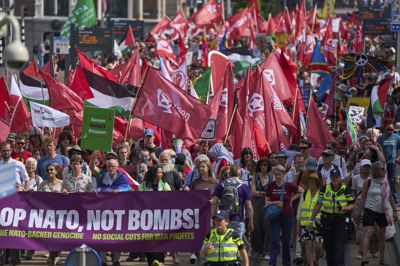 Hundreds protest in The Hague against NATO, days before the Dutch city hosts alliance summit | iNFOnews.ca Hundreds protest in The Hague against NATO, days before the Dutch city hosts alliance summit | iNFOnews.ca