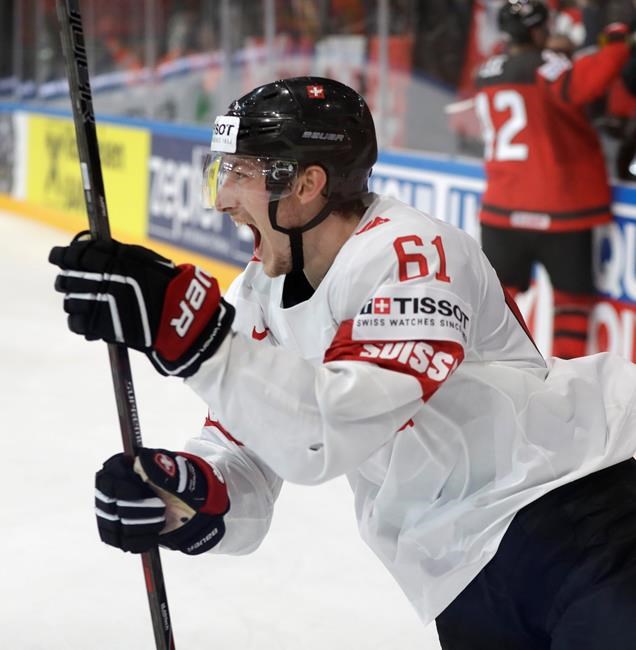 Fabrice Herzog scores OT winner as Switzerland stuns Canada at worlds | iNFOnews.ca Fabrice Herzog scores OT winner as Switzerland stuns Canada at worlds | iNFOnews.ca