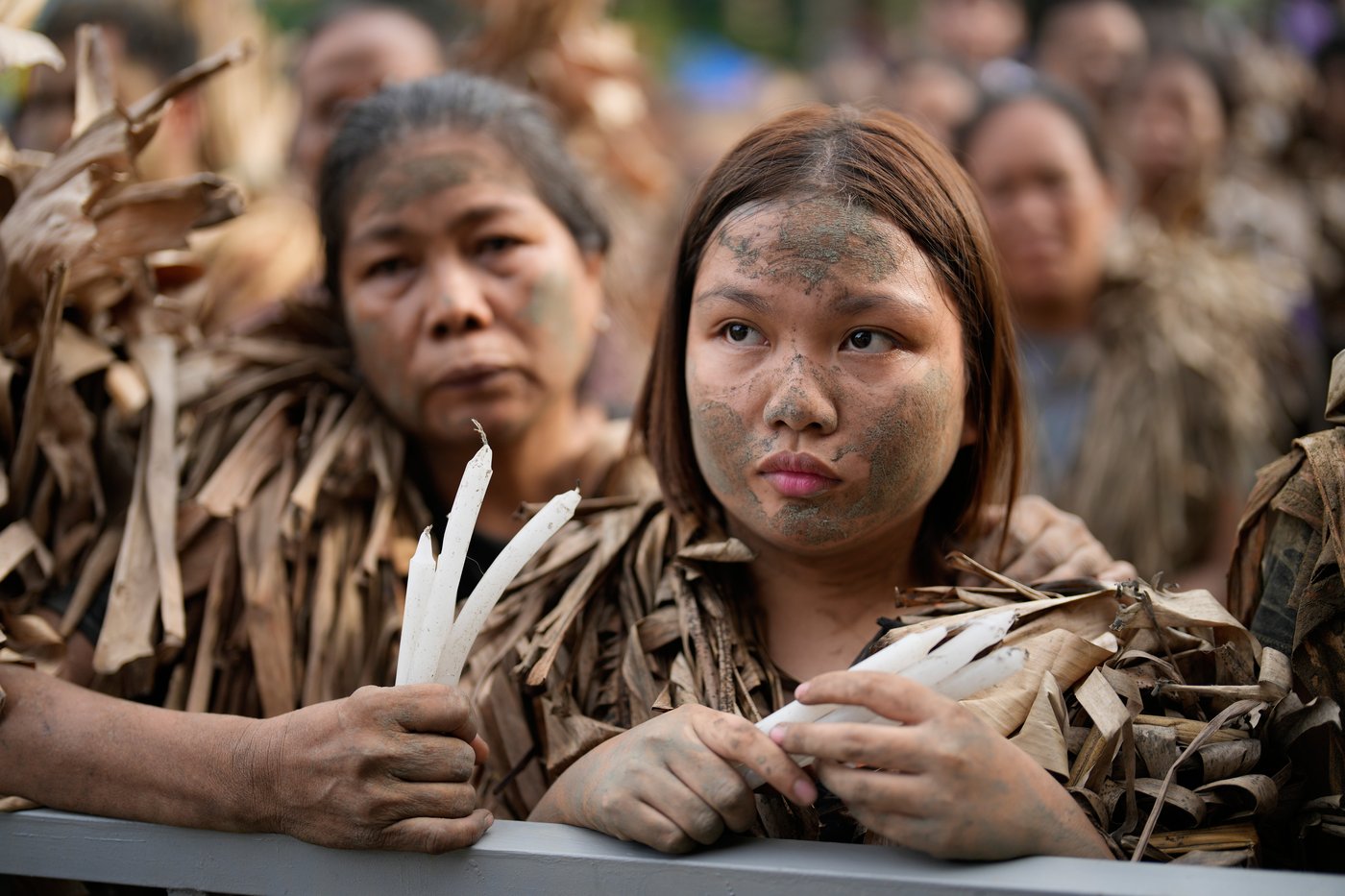 Photos show Philippine Catholics smearing mud on their bodies for festival honoring John the Baptist | iNFOnews.ca