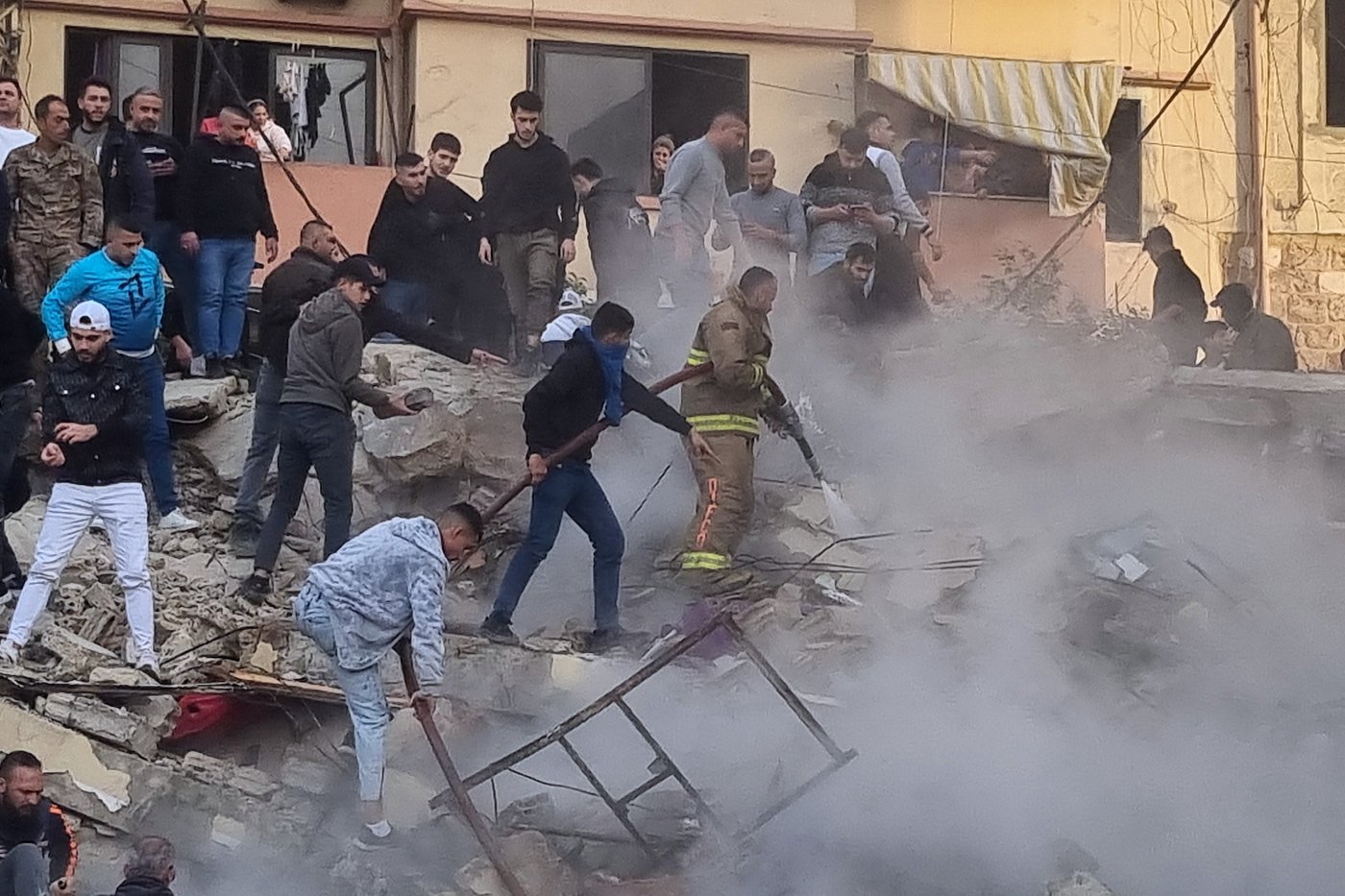 Rescue teams search for survivors in building collapse that killed at least 9 in northern Lebanon | iNFOnews.ca Rescue teams search for survivors in building collapse that killed at least 9 in northern Lebanon | iNFOnews.ca
