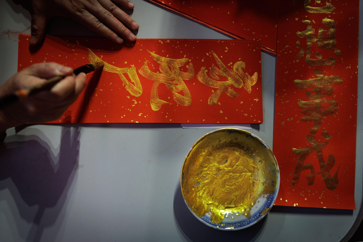 Photos follow the color red through public and intimate spaces during the Lunar New Year | iNFOnews.ca