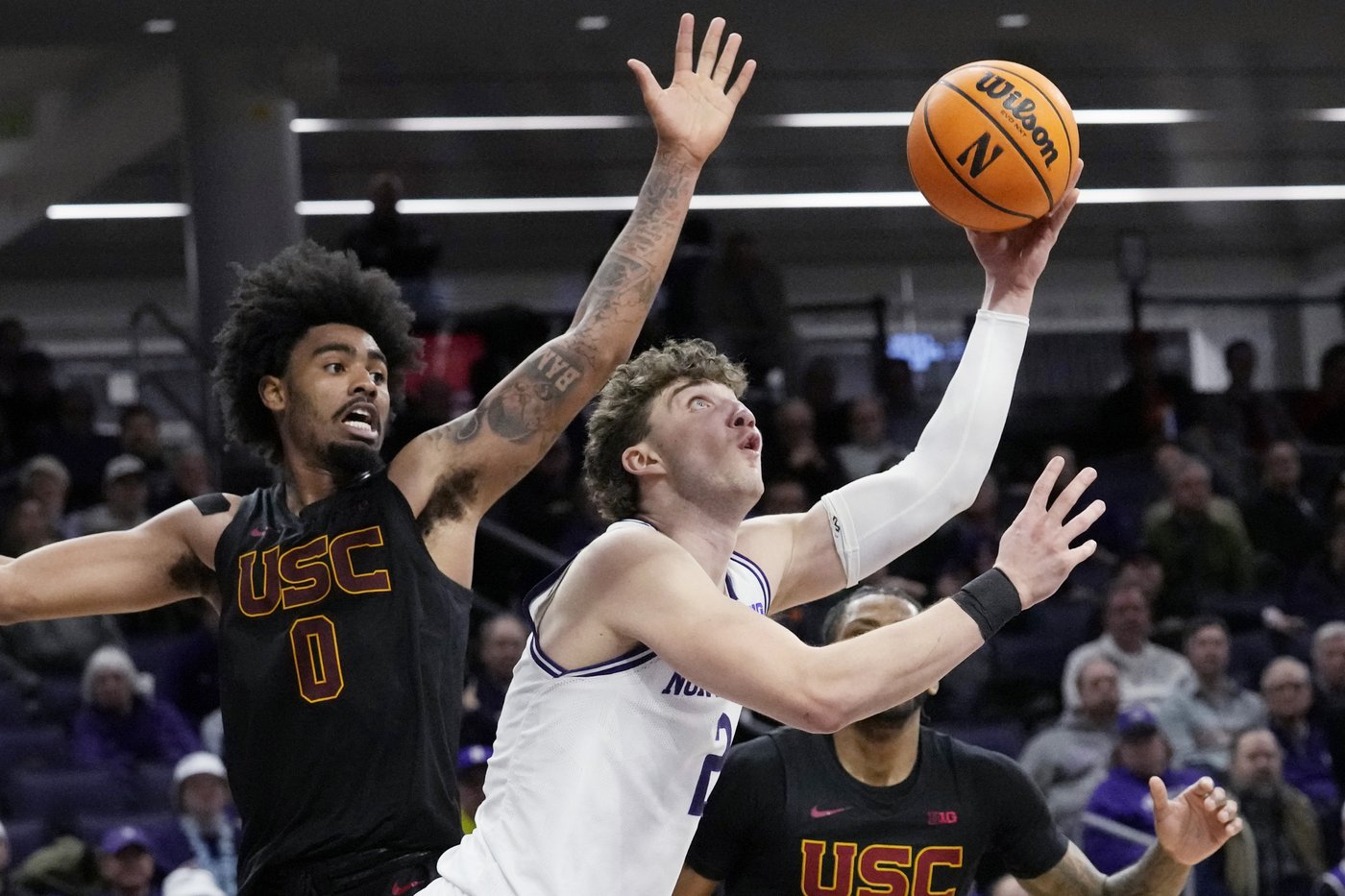 Northwestern uses Martinelli's last second heroics to stave off USC 77-75 | iNFOnews.ca