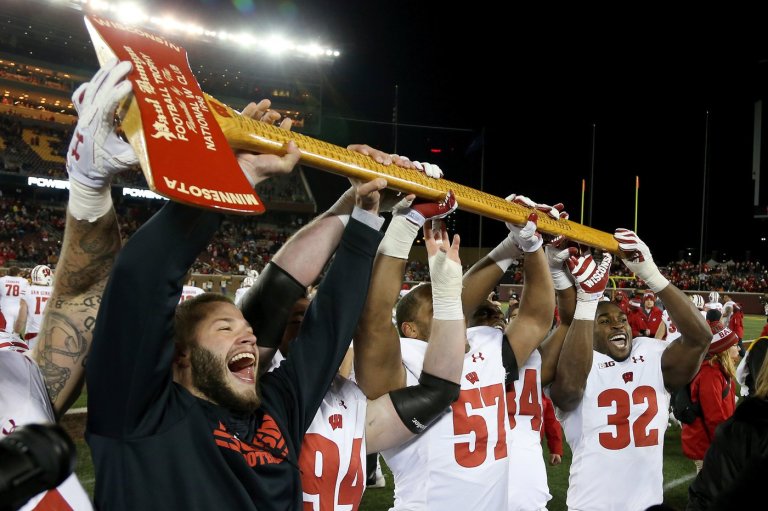 What do an axe, a bucket and a cannon have in common? Meet the rivalry trophies of college football | iNFOnews.ca