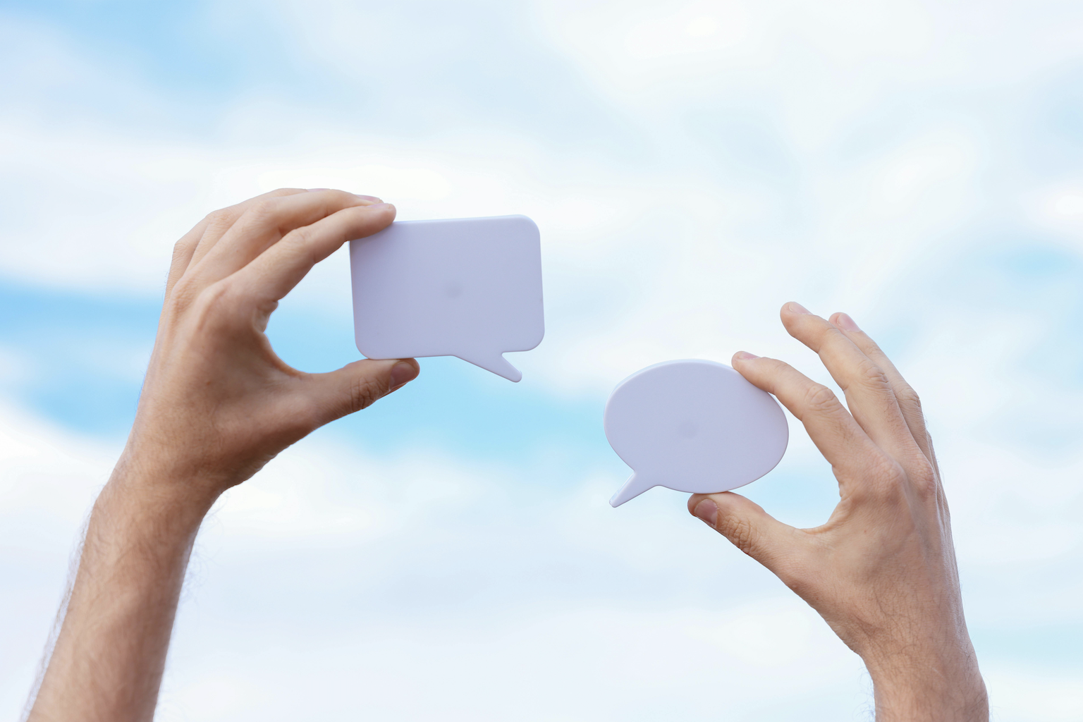 Hands old conversation bubbles.