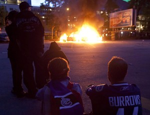 Civil claim involving destruction at riot brings back memories of torched car | iNFOnews.ca CP23826617