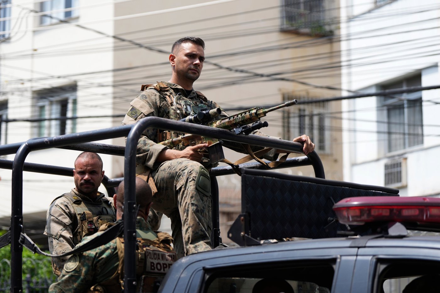 Rio police pull 4 officers from street duty in a probe into a deadly raid | iNFOnews.ca