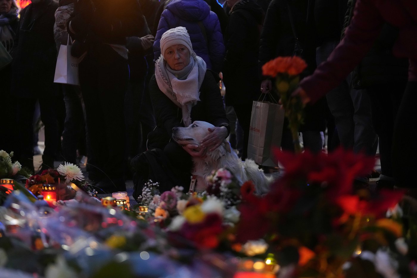 Germans mourn the 5 killed and 200 injured in the apparent attack on a Christmas market | iNFOnews.ca