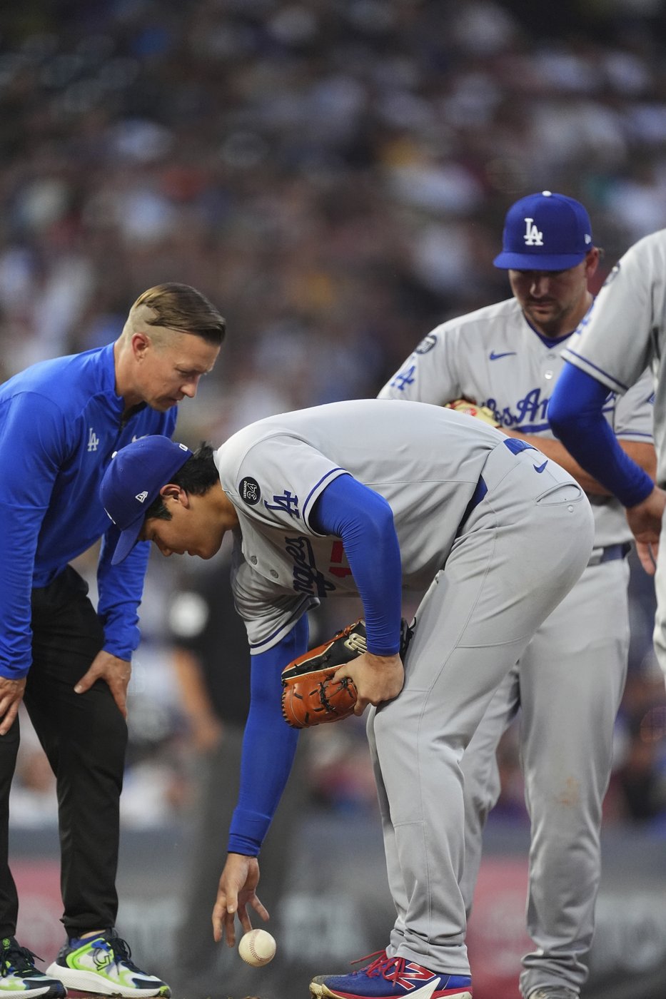 Dodgers' Ohtani roughed up by Rockies, leaves game after getting hit on right thigh by line drive | iNFOnews.ca