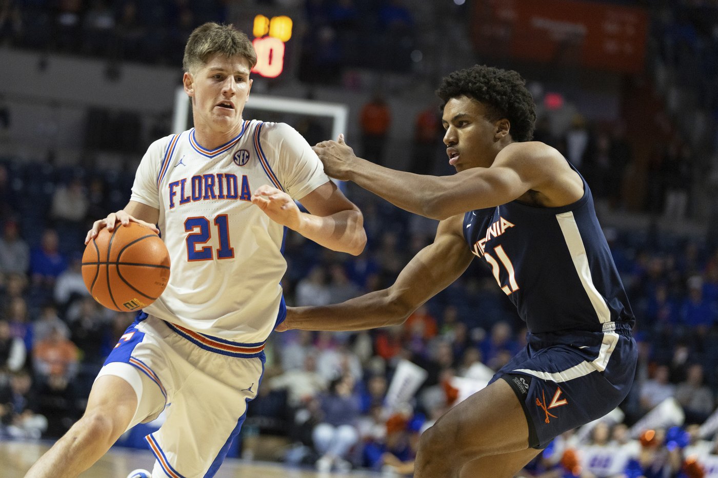 Walter Clayton scores 27 points, No. 13 Florida beats Virginia 87-69 in SEC/ACC Challenge | iNFOnews.ca