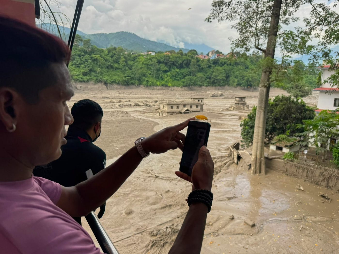 Photos show aftermath of flash floods in Nepal | iNFOnews.ca