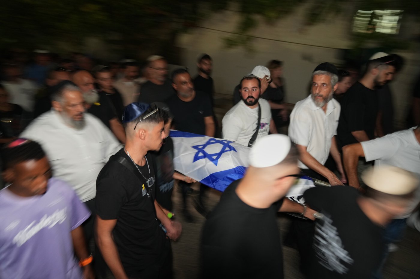 The Latest: Israel identifies remains of 2 more hostages | iNFOnews.ca