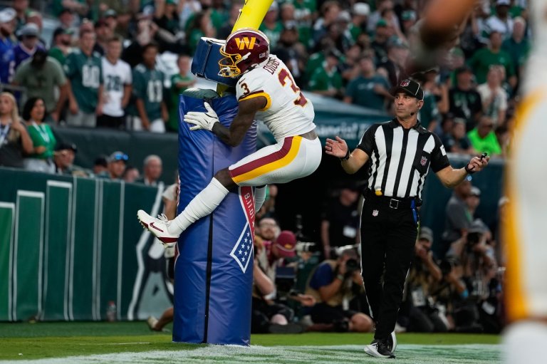 Stefon Diggs hugs the goalpost and gets flagged for costly penalty in Commanders' loss to Eagles | iNFOnews.ca
