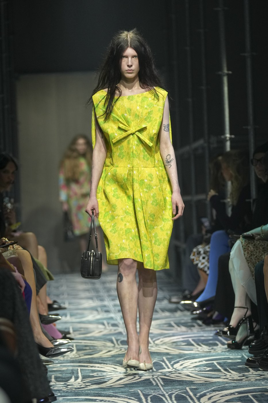 Prada reconstructs femininity starting with the little black dress fit to dark times | iNFOnews.ca