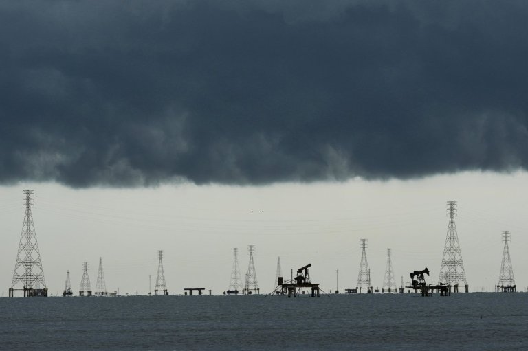 Photos show broken oil infrastructure and blackouts on Venezuela's Lake Maracaibo | iNFOnews.ca