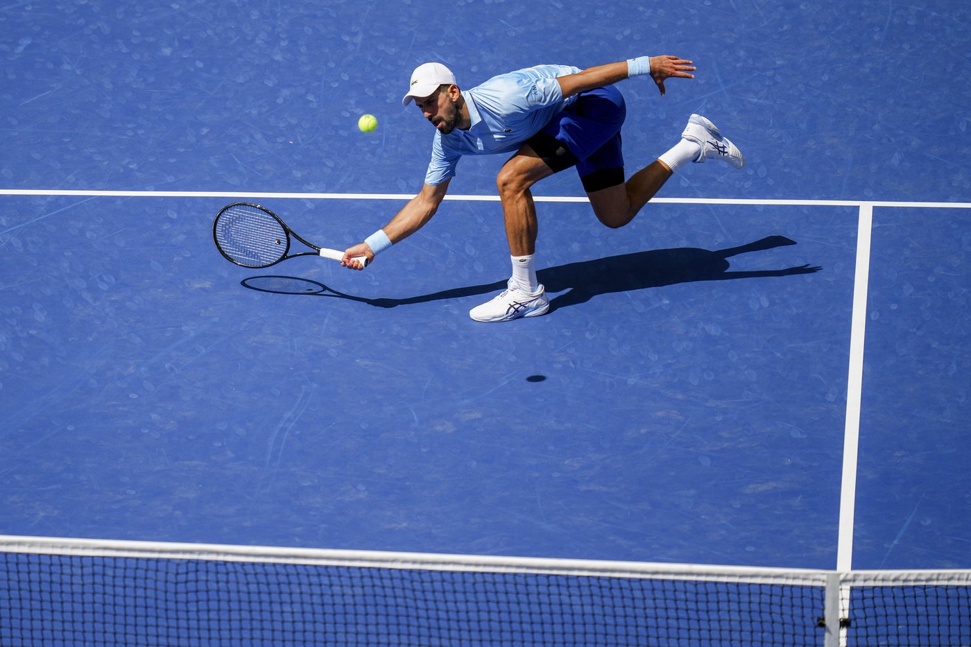 Novak Djokovic drops 1st set to a qualifier but advances to 3rd round of US Open | iNFOnews.ca
