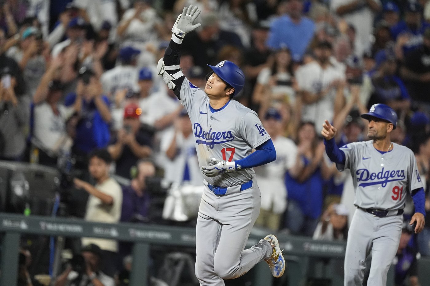 Ohtani launches homer No. 54, steals 57th base as NL West-champion Dodgers power by Rockies 11-4 | iNFOnews.ca