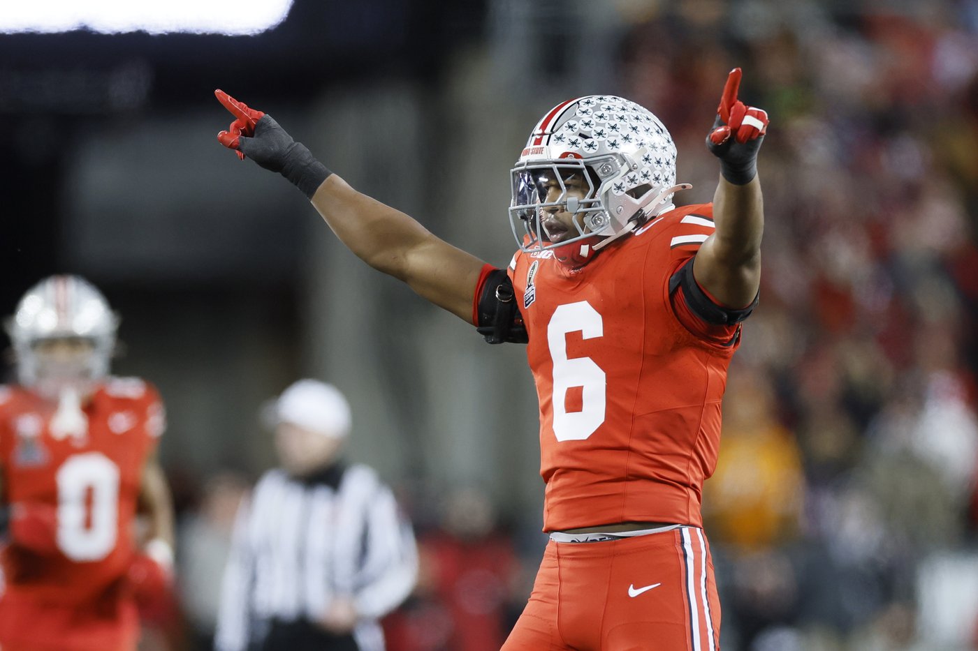 Howard throws 2 TD passes to Smith to help Ohio State rout Tennessee 42-17 in CFP | iNFOnews.ca Howard throws 2 TD passes to Smith to help Ohio State rout Tennessee 42-17 in CFP | iNFOnews.ca