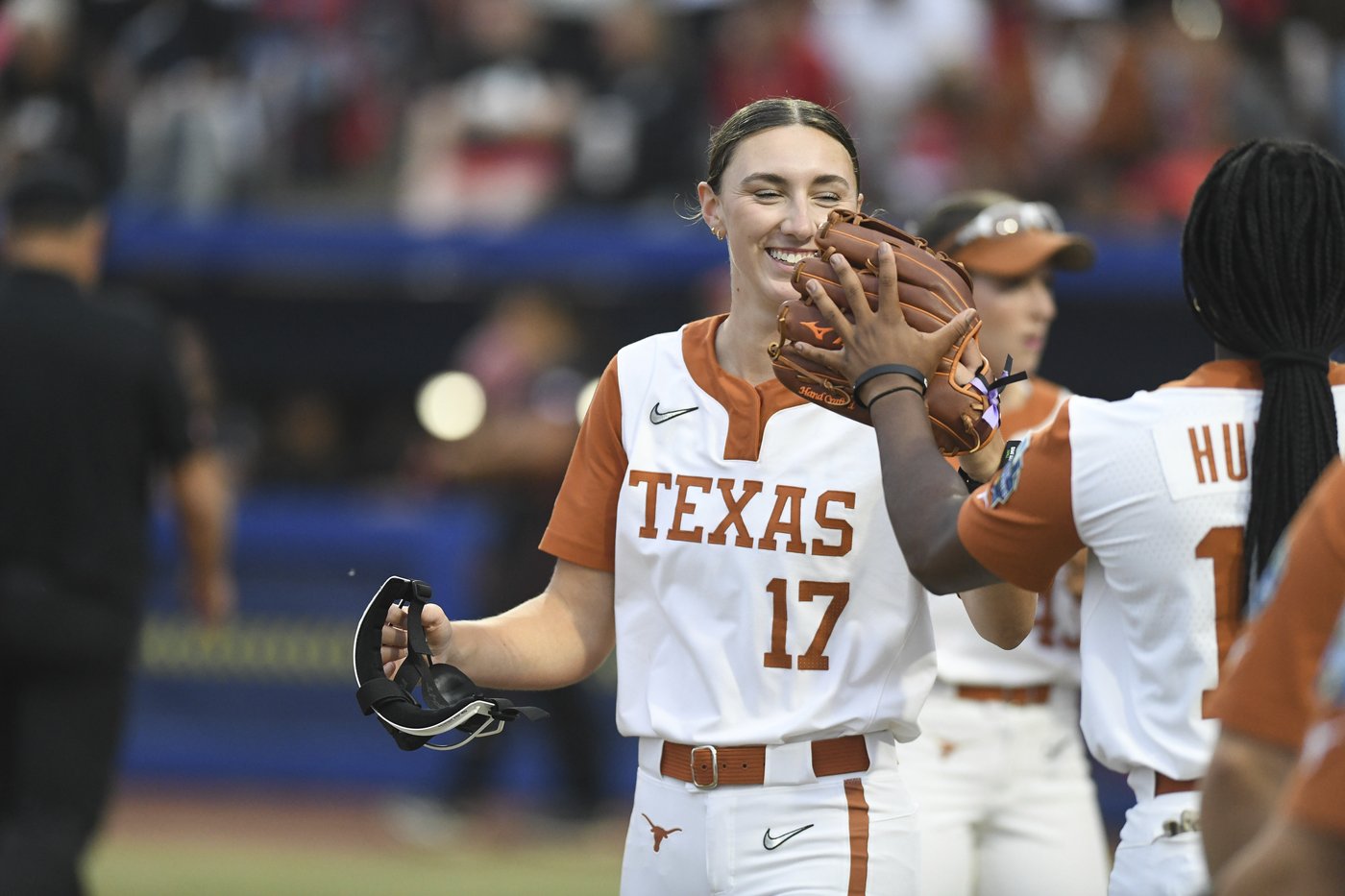 Atwood's hit on intentional walk attempt gives Texas a 2-1 win over Texas Tech in WCWS finals opener | iNFOnews.ca