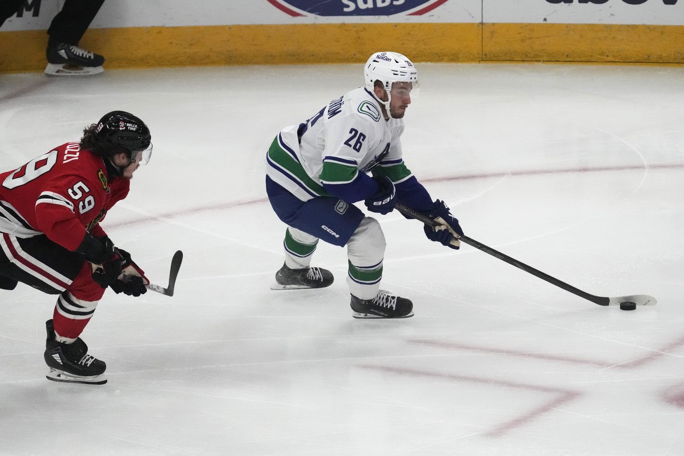 Heinen scores twice as the Canucks beat the Blackhawks 6-3 for their 3rd straight win | iNFOnews.ca Heinen scores twice as the Canucks beat the Blackhawks 6-3 for their 3rd straight win | iNFOnews.ca