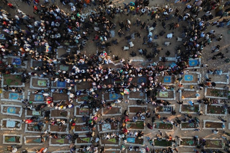 Photos of the funeral for victims of a deadly prison fire and riot in northern Syria | iNFOnews.ca