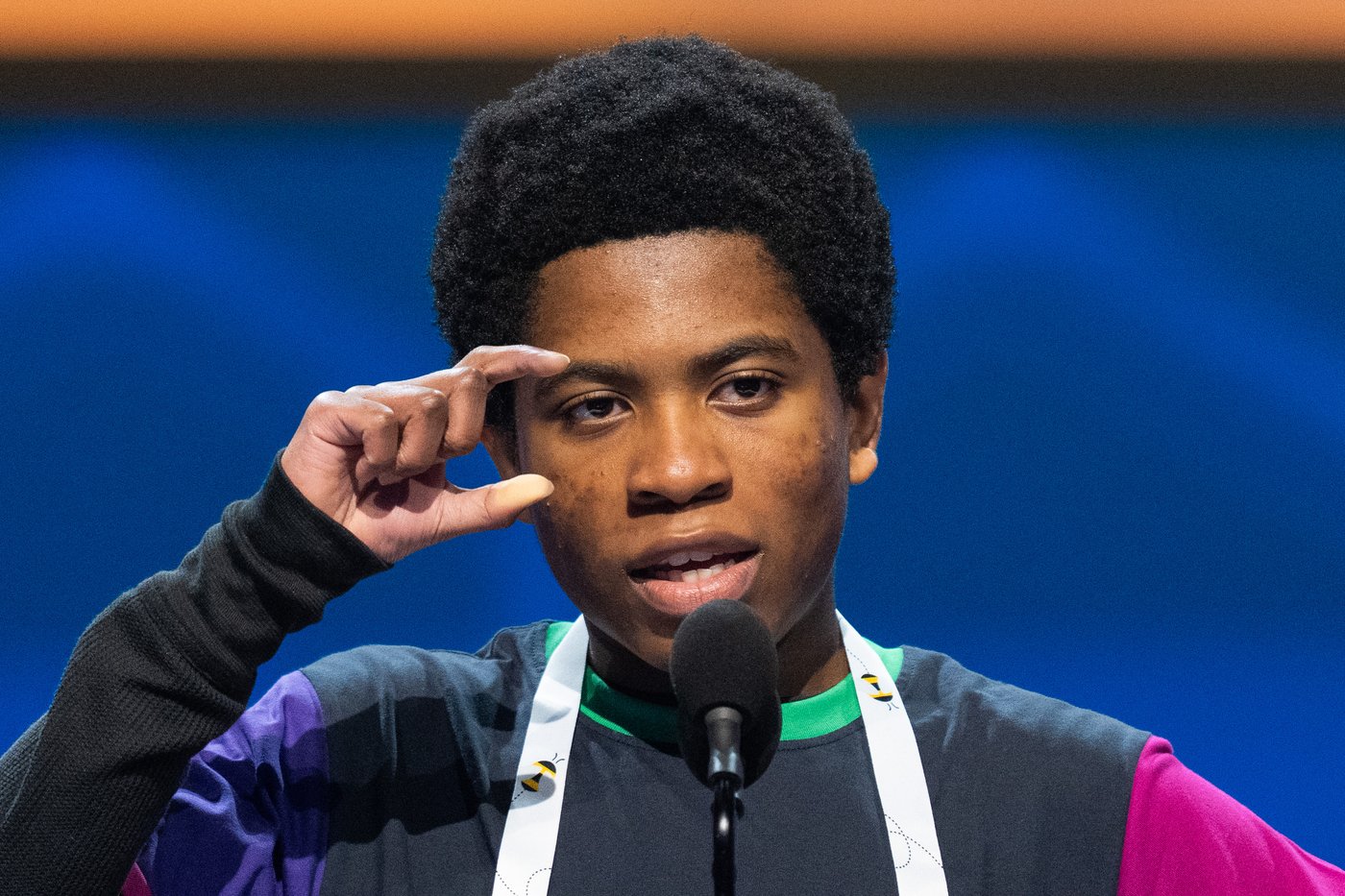 Photos of students competing for the Scripps National Spelling Bee trophy | iNFOnews.ca