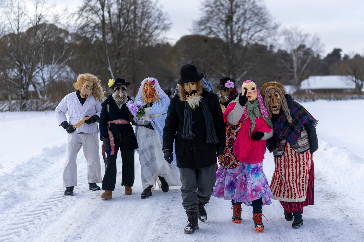Photos show masked revelers celebrating Shrovetide in Lithuania | iNFOnews.ca