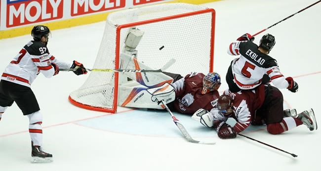 McDavid scores in overtime as Canada hangs on for 2-1 victory over Latvia | iNFOnews.ca