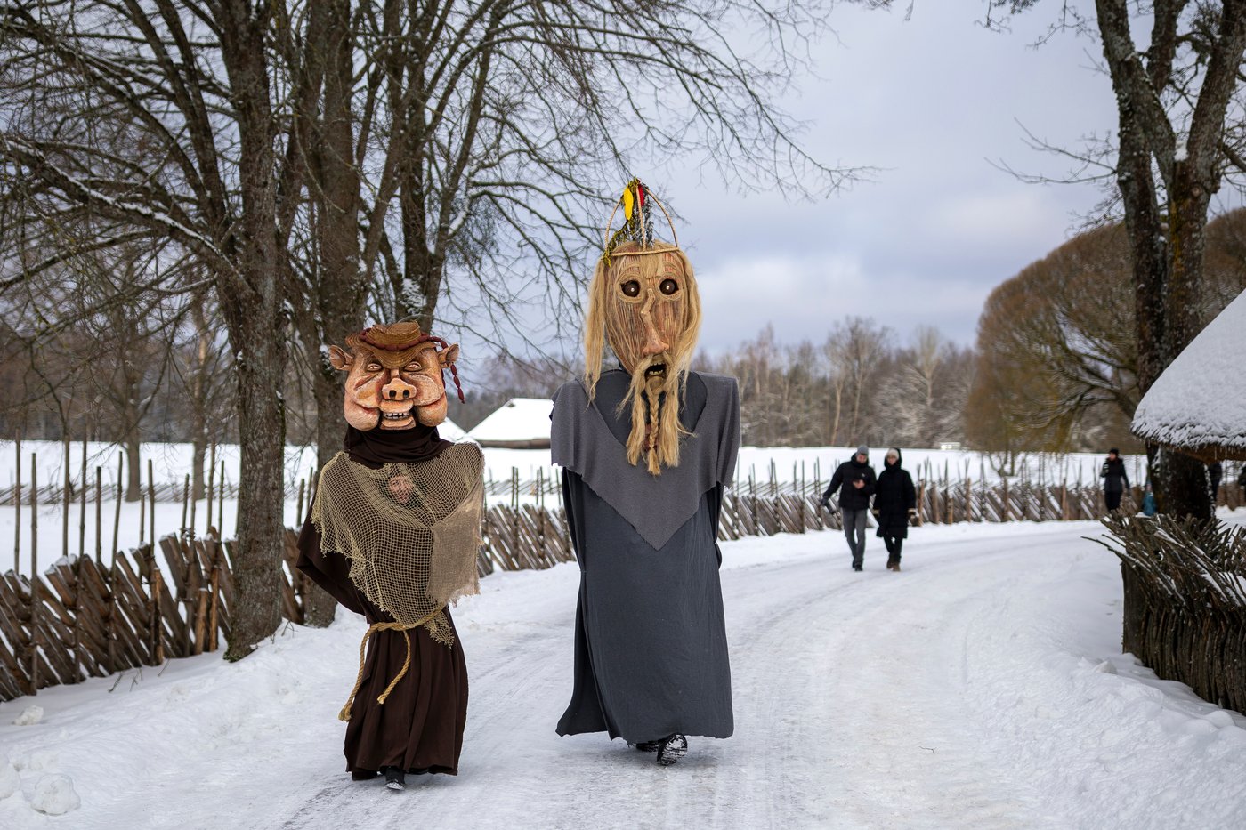 Photos show masked revelers celebrating Shrovetide in Lithuania | iNFOnews.ca