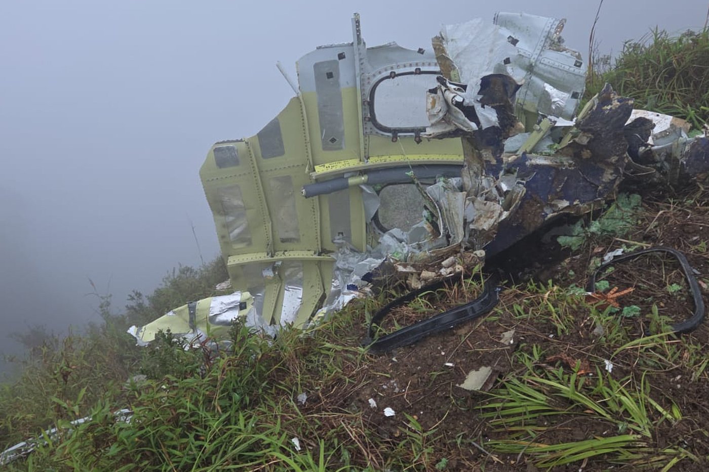 Indonesian rescuers find a body near wreckage of a plane that crashed with 11 aboard | iNFOnews.ca