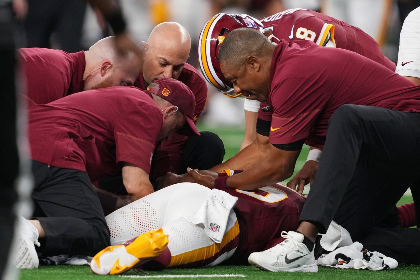 Commanders QB Jayden Daniels dislocates his left elbow for the second time in less than a year | iNFOnews.ca