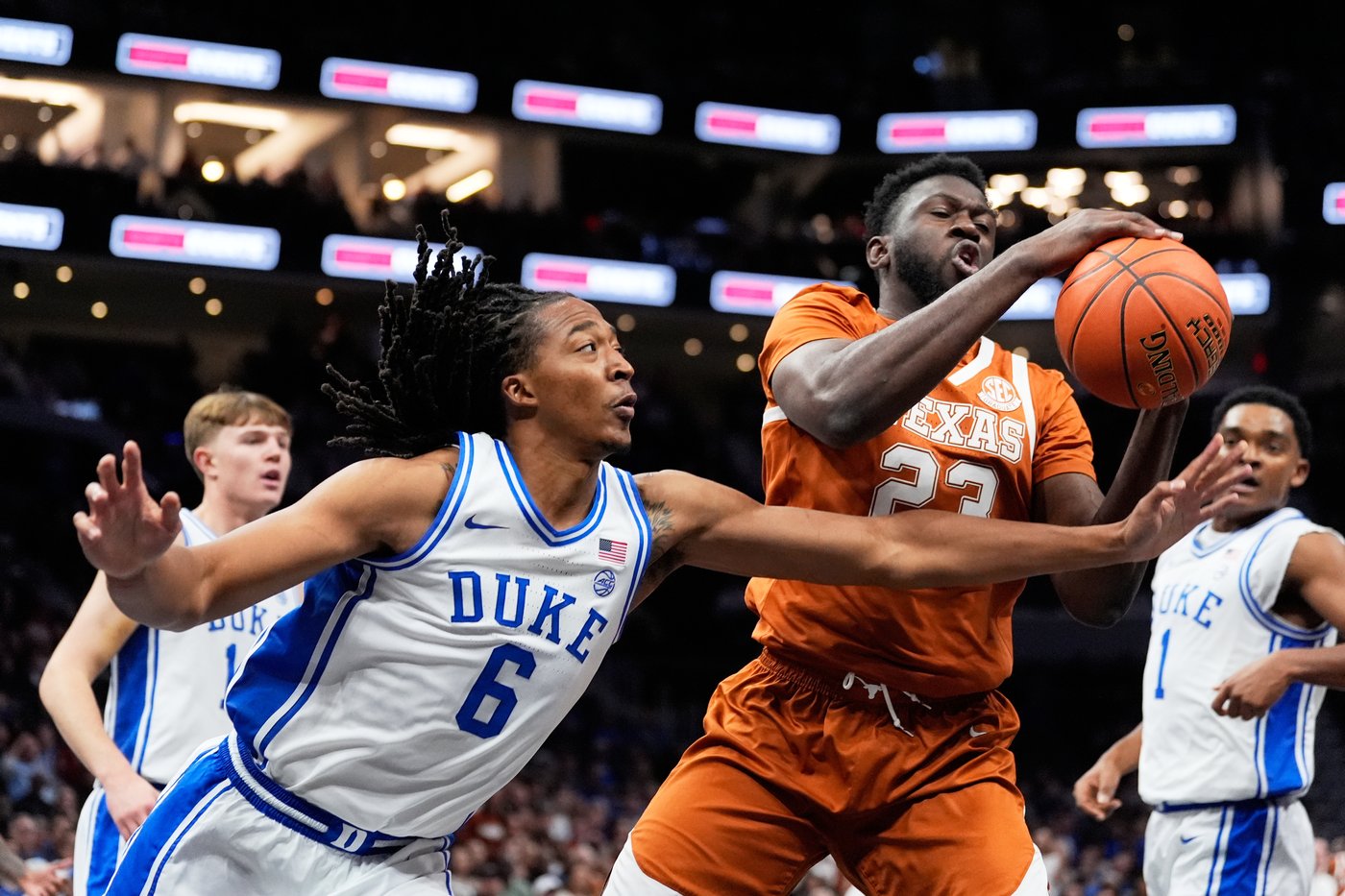 Evans, Boozer help No. 6 Duke overcome slow start and defeat Texas 75-60 in season opener | iNFOnews.ca
