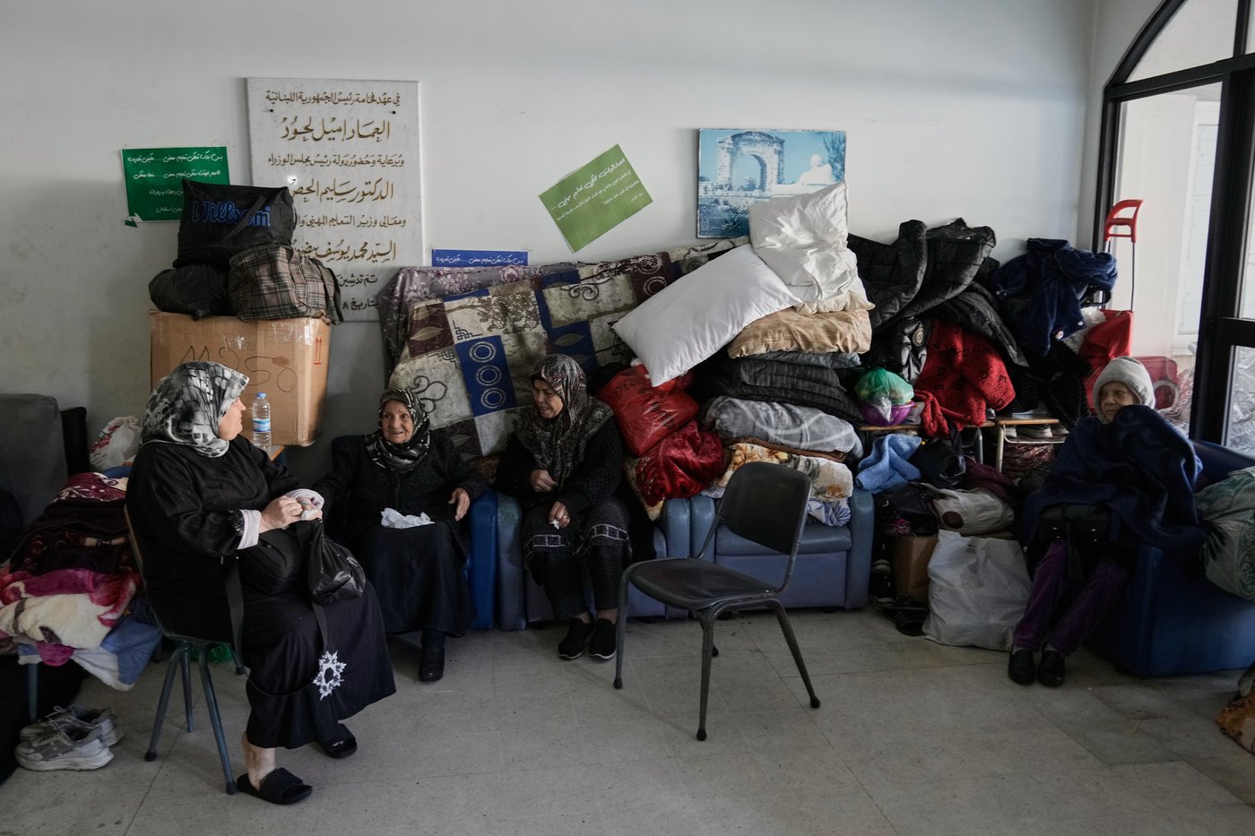 Photos of displaced civilians in Lebanon, where schools and stadiums turn into shelters during war | iNFOnews.ca