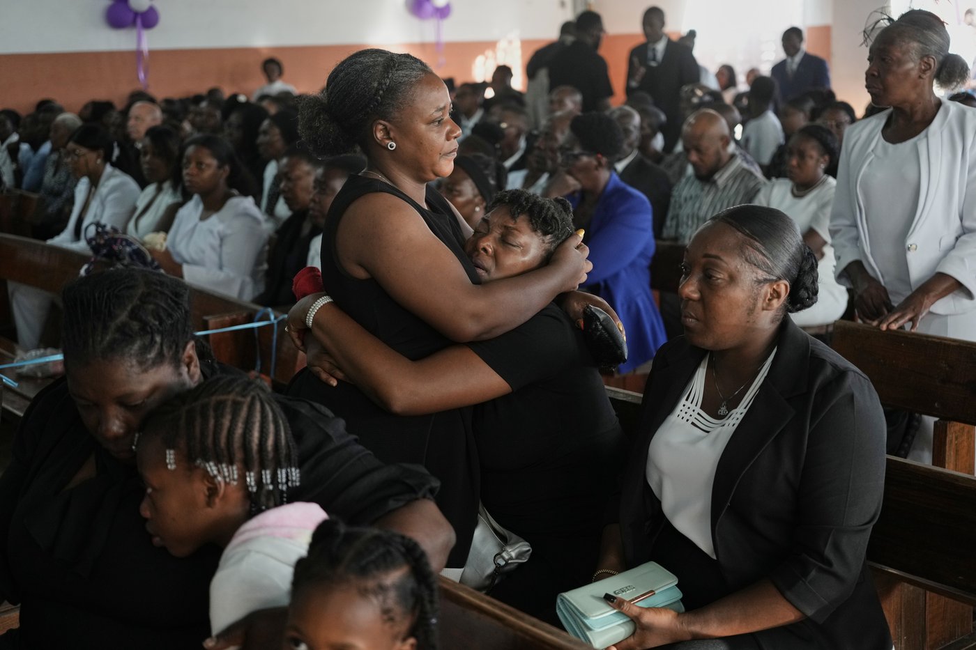 Hundreds attend funeral in Haiti for 4 victims of brutal gang attack that killed 47 | iNFOnews.ca