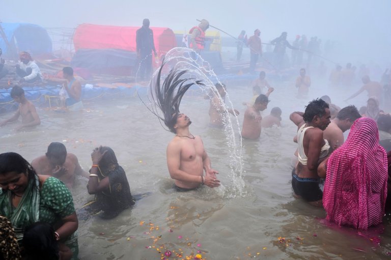 Photos show devotees taking a holy dip at Sangam during Mauni Amavasya festival in India | iNFOnews.ca
