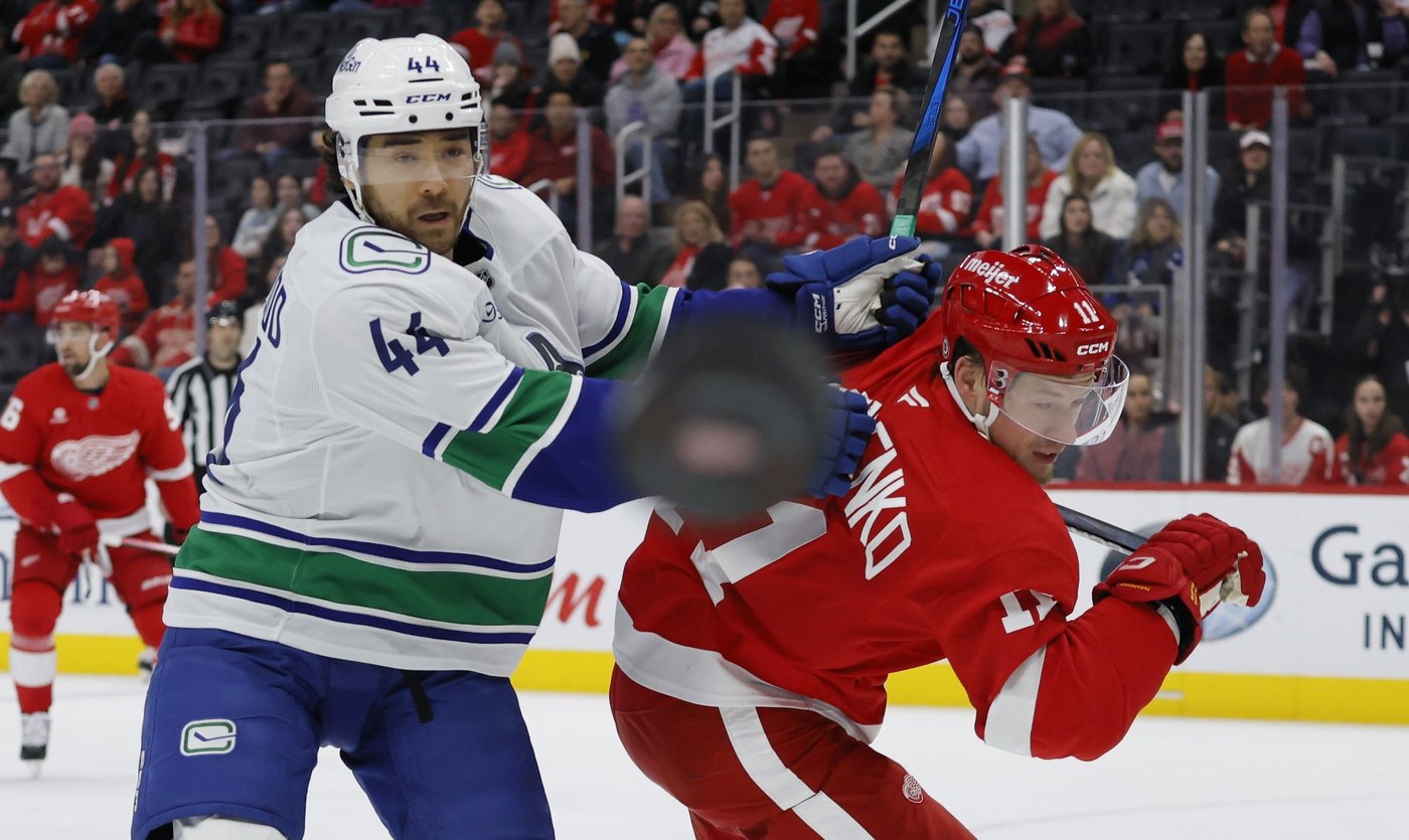 Jake DeBrusk scores hat trick, including OT game-winner, as Canucks top Red Wings 5-4 | iNFOnews.ca