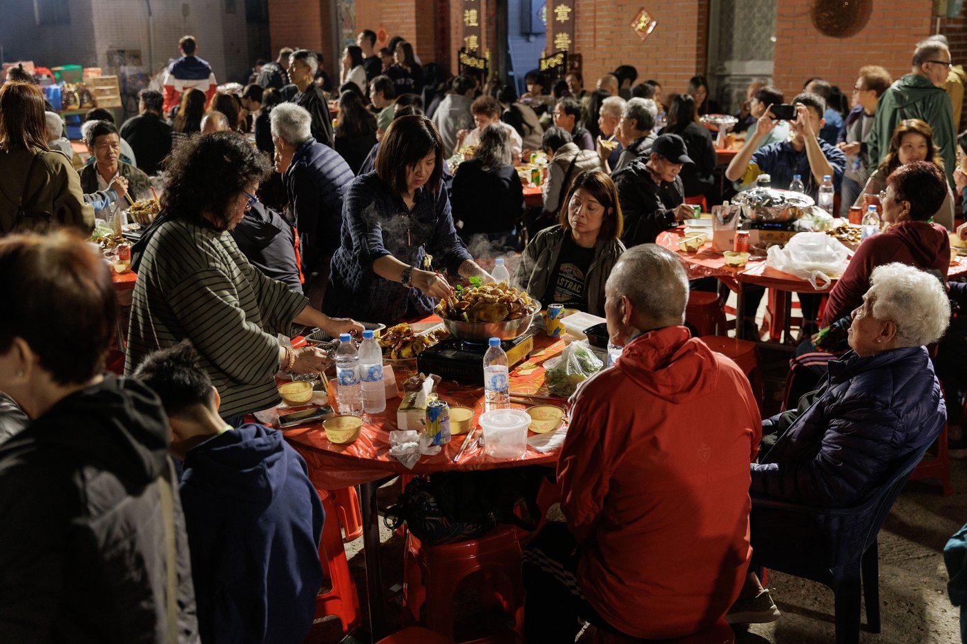 Photos follow the color red through public and intimate spaces during the Lunar New Year | iNFOnews.ca