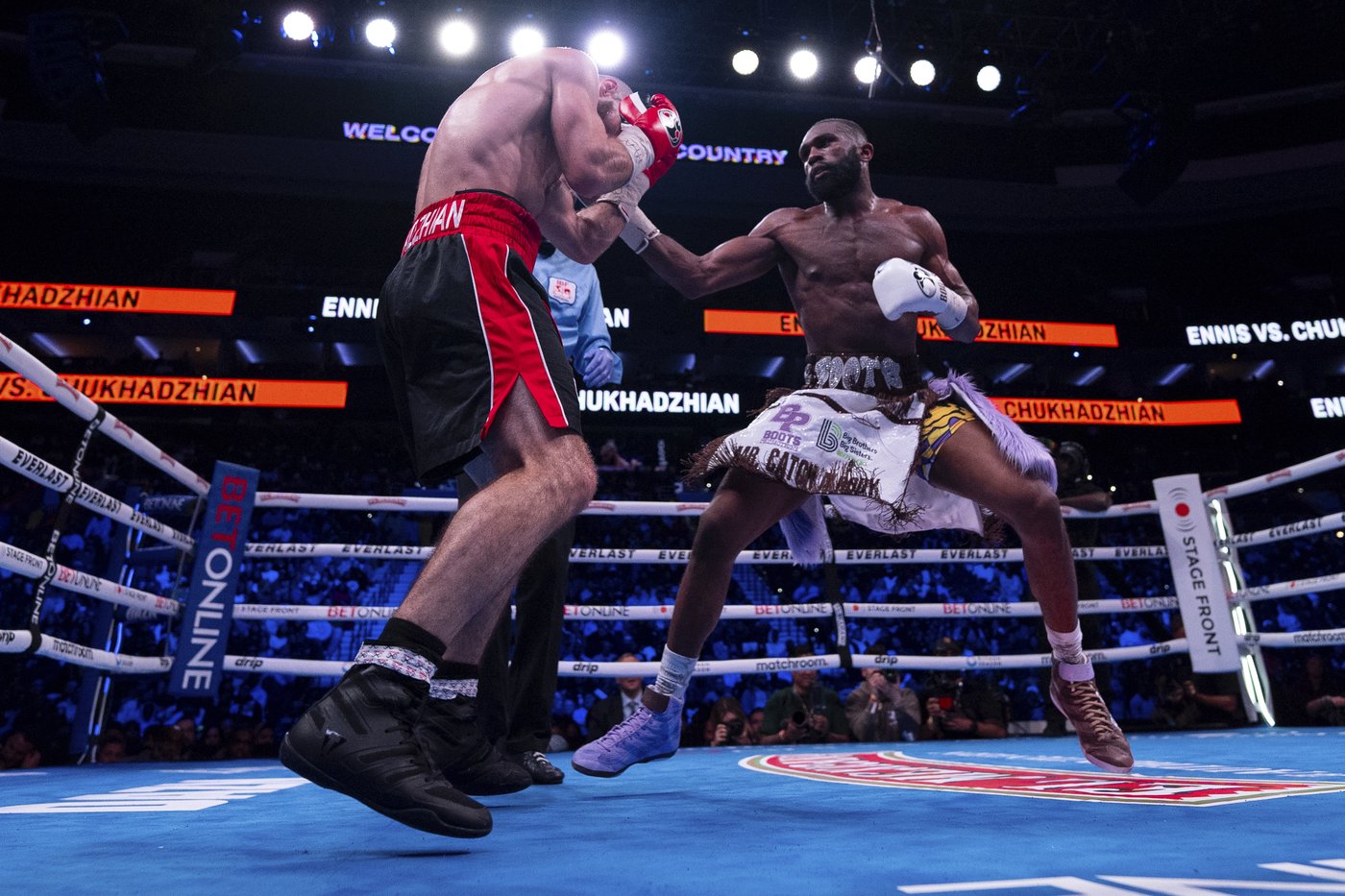 'Boots' Ennis defends welterweight championship with unanimous decision win over Chukhadzhian | iNFOnews.ca 'Boots' Ennis defends welterweight championship with unanimous decision win over Chukhadzhian | iNFOnews.ca