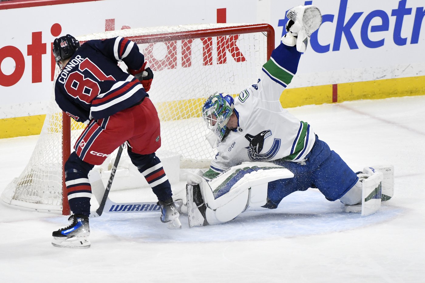 Connor nets hat trick, Jets soar past Canucks 6-1 | iNFOnews.ca