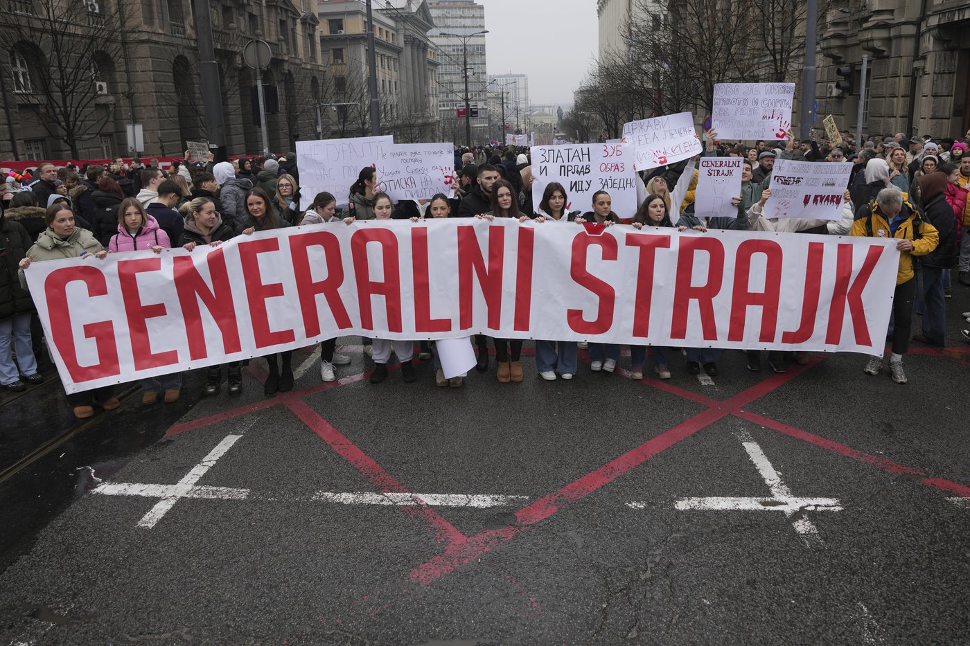 A driver rams an anti-government rally in Serbia's capital and injures one protester | iNFOnews.ca