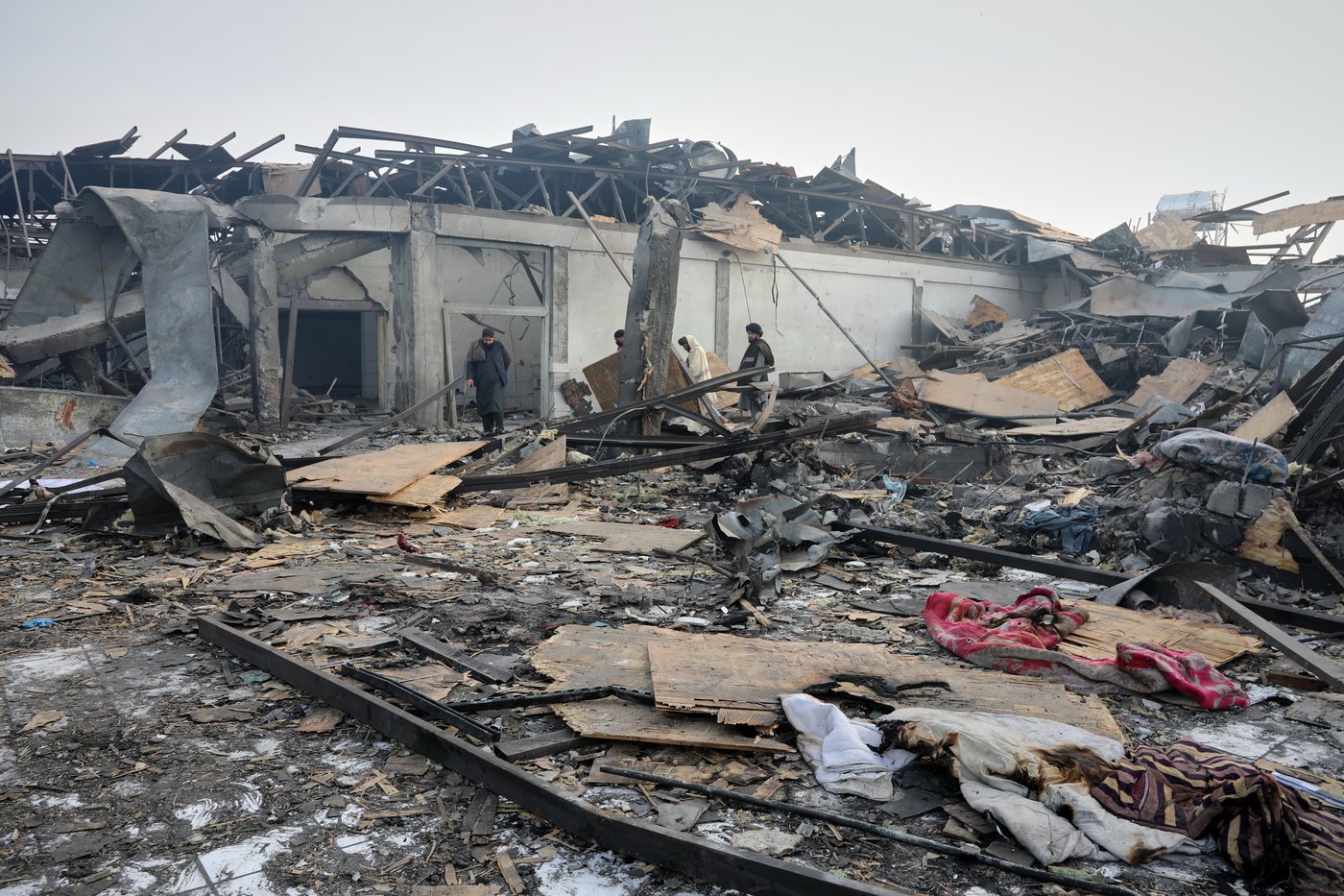 Rescue crews dig bodies out of the ruins of a Kabul hospital hit in an airstrike blamed on Pakistan | iNFOnews.ca Rescue crews dig bodies out of the ruins of a Kabul hospital hit in an airstrike blamed on Pakistan | iNFOnews.ca
