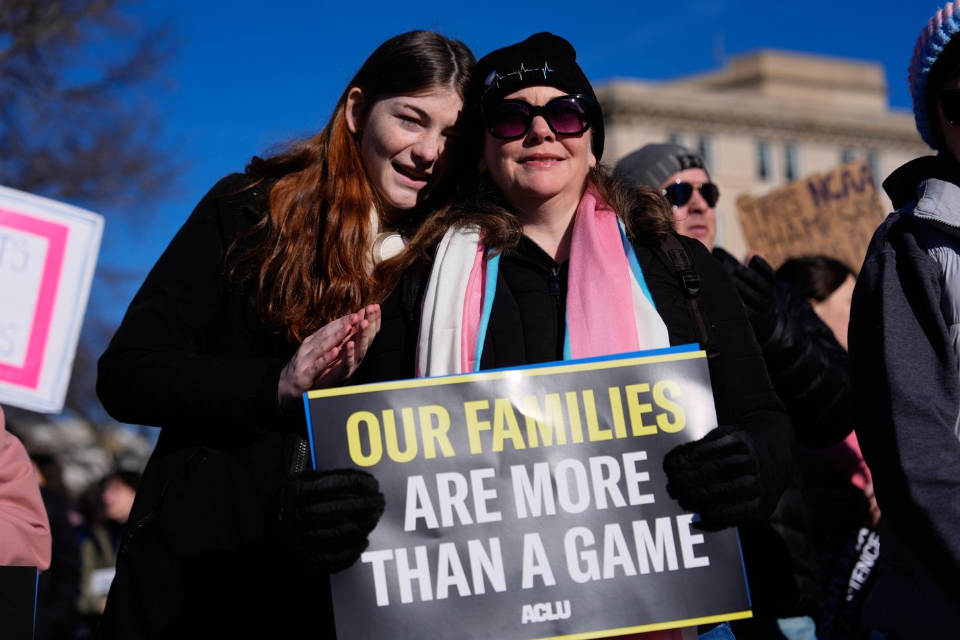 Photos of demonstrators outside the Supreme Court as it considers upholding transgender sports bans | iNFOnews.ca