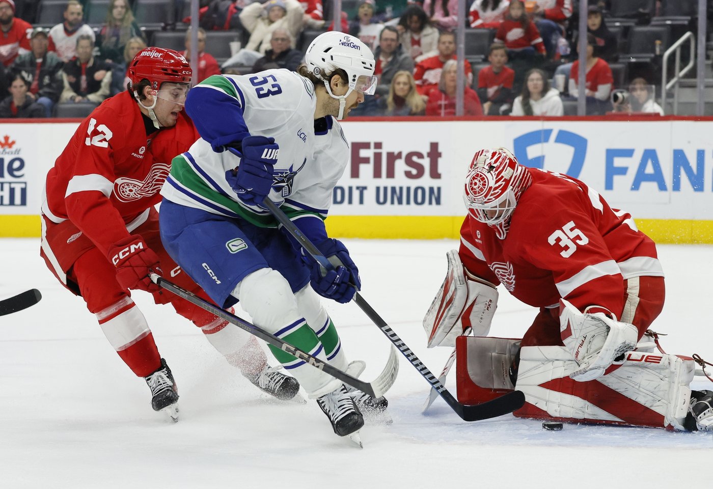 Jake DeBrusk scores hat trick, including OT game-winner, as Canucks top Red Wings 5-4 | iNFOnews.ca