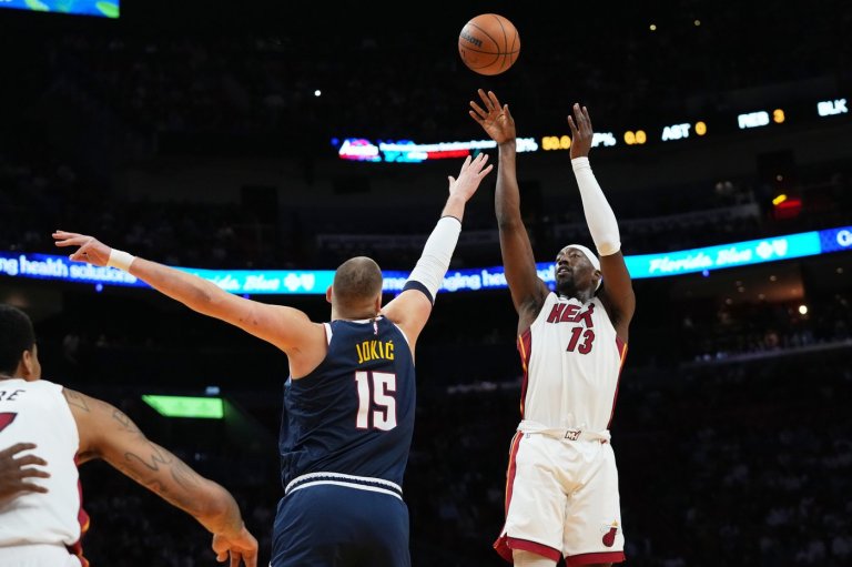 Jokic gets hurt late in 1st half, Heat pull away from there to top Nuggets | iNFOnews.ca