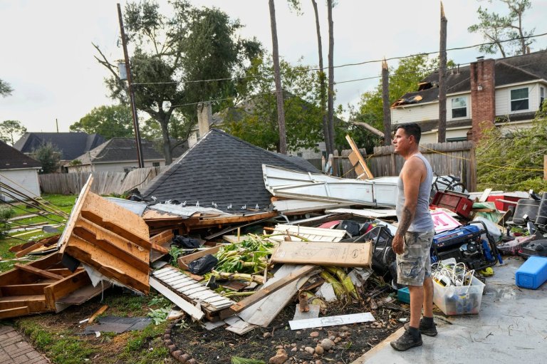Torn roofs, smashed windows among damage to over 100 homes in a tornado near Houston | iNFOnews.ca