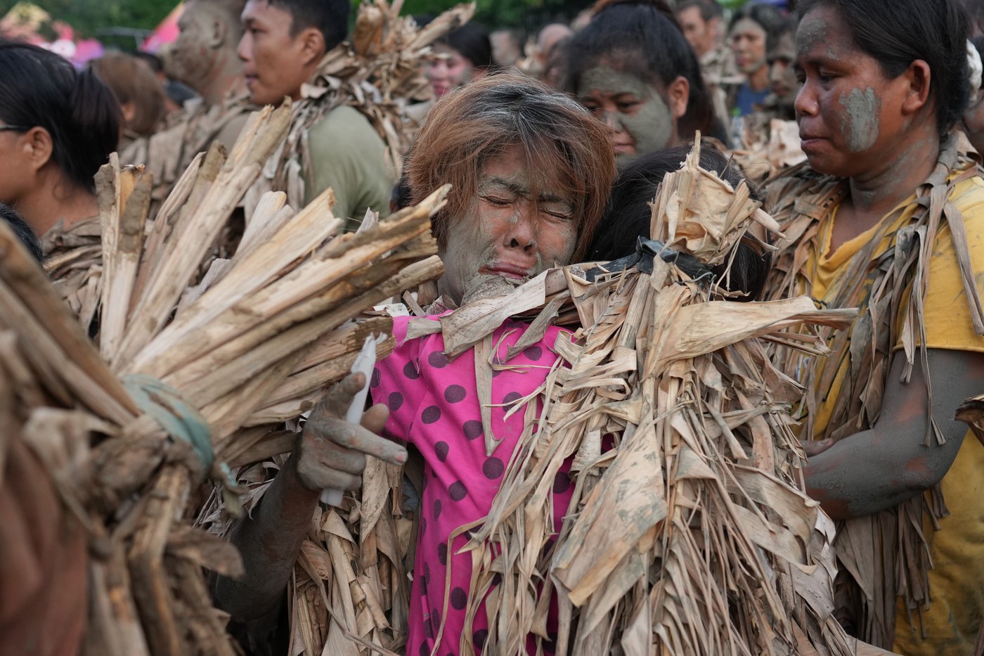 Photos show Philippine Catholics smearing mud on their bodies for festival honoring John the Baptist | iNFOnews.ca