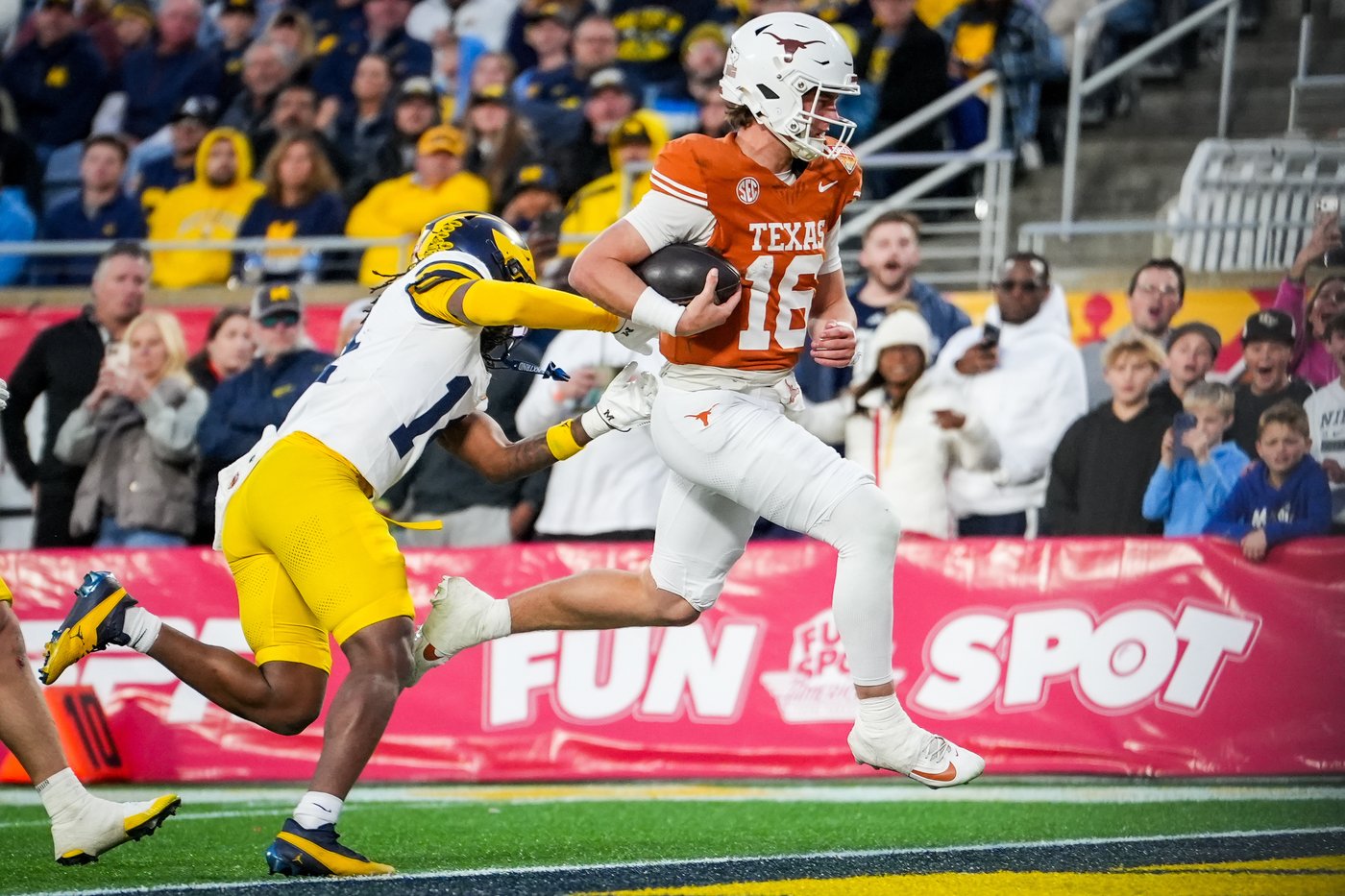 Arch Manning runs and passes Texas past Michigan in Citrus Bowl | iNFOnews.ca