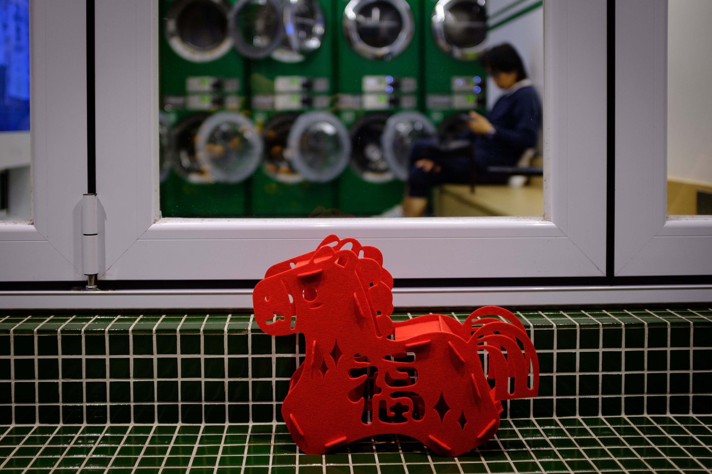 Photos follow the color red through public and intimate spaces during the Lunar New Year | iNFOnews.ca