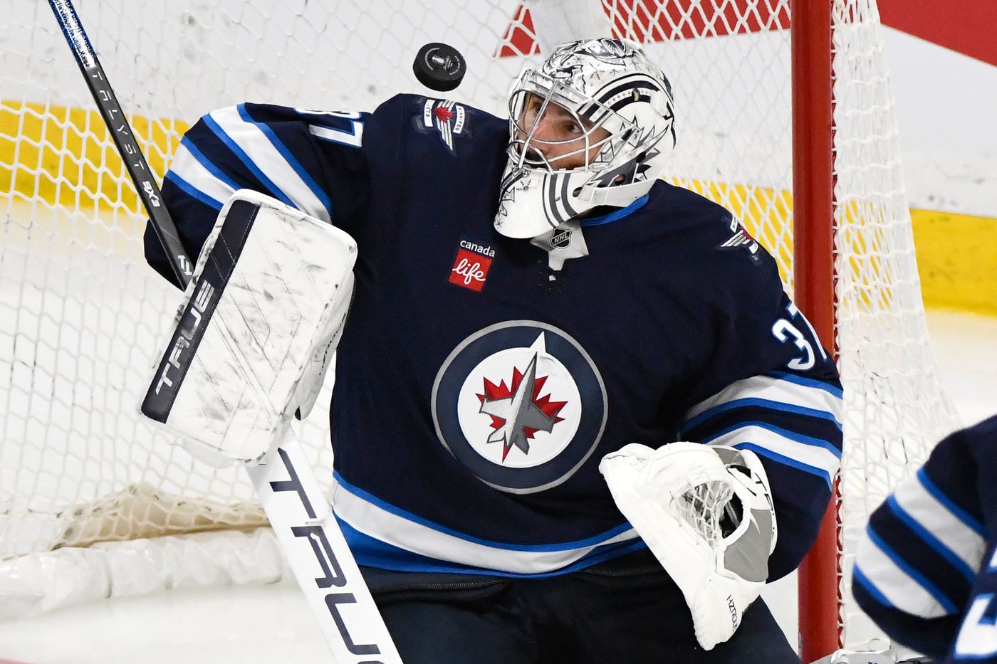 Hellebuyck happy to be with the Devils after a long wait for a trade from the Jets | iNFOnews.ca