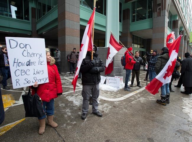 Small group of Cherry supporters protest his firing outside Rogers headquarters | iNFOnews.ca