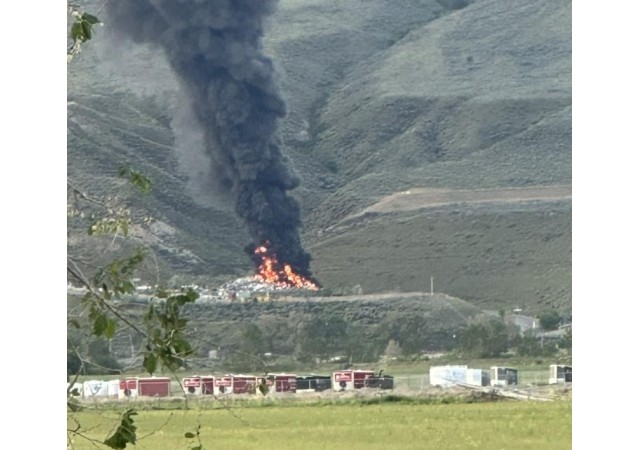 A fire at the base of a mountain.